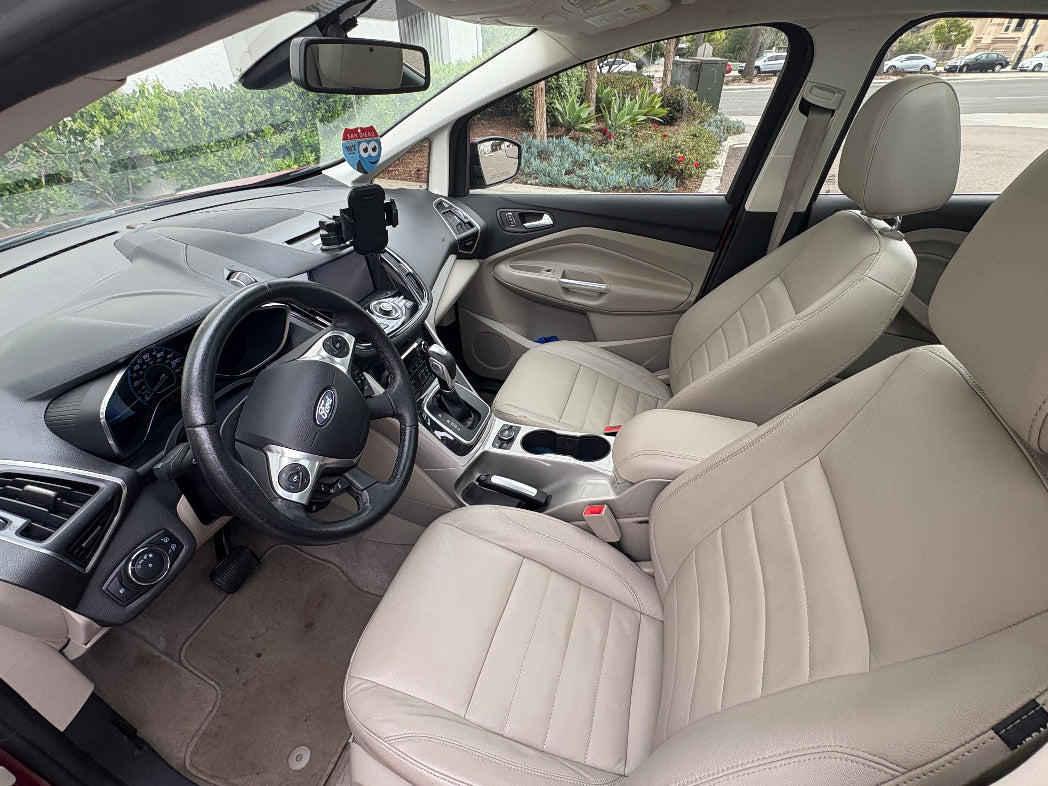 Ford C-Max 2013 hybrid car rental interior with digital display