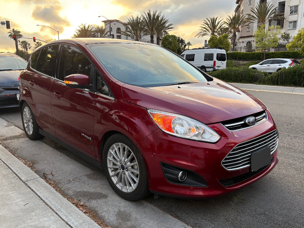 Side profile of Ford C-Max Hybrid 2013 rental car