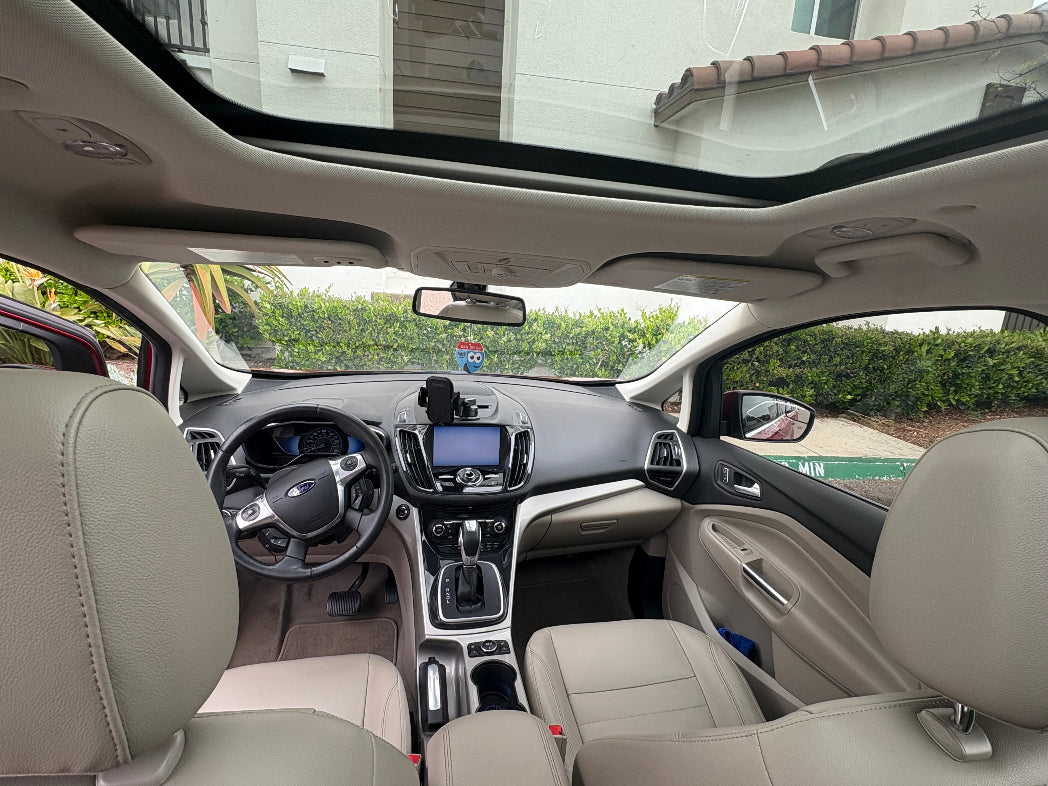Beige leather interior of Ford C-Max Hybrid 2013