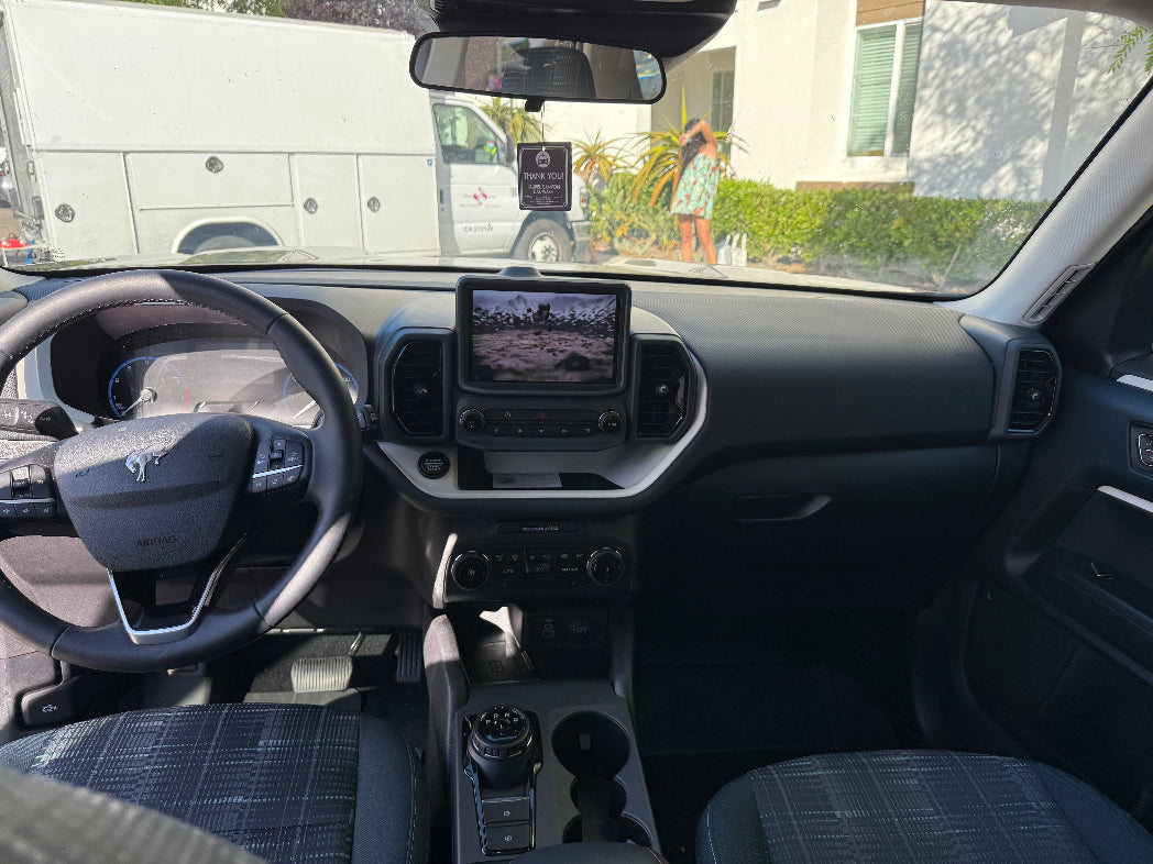 Car interior with dashboard camera and touchscreen display
