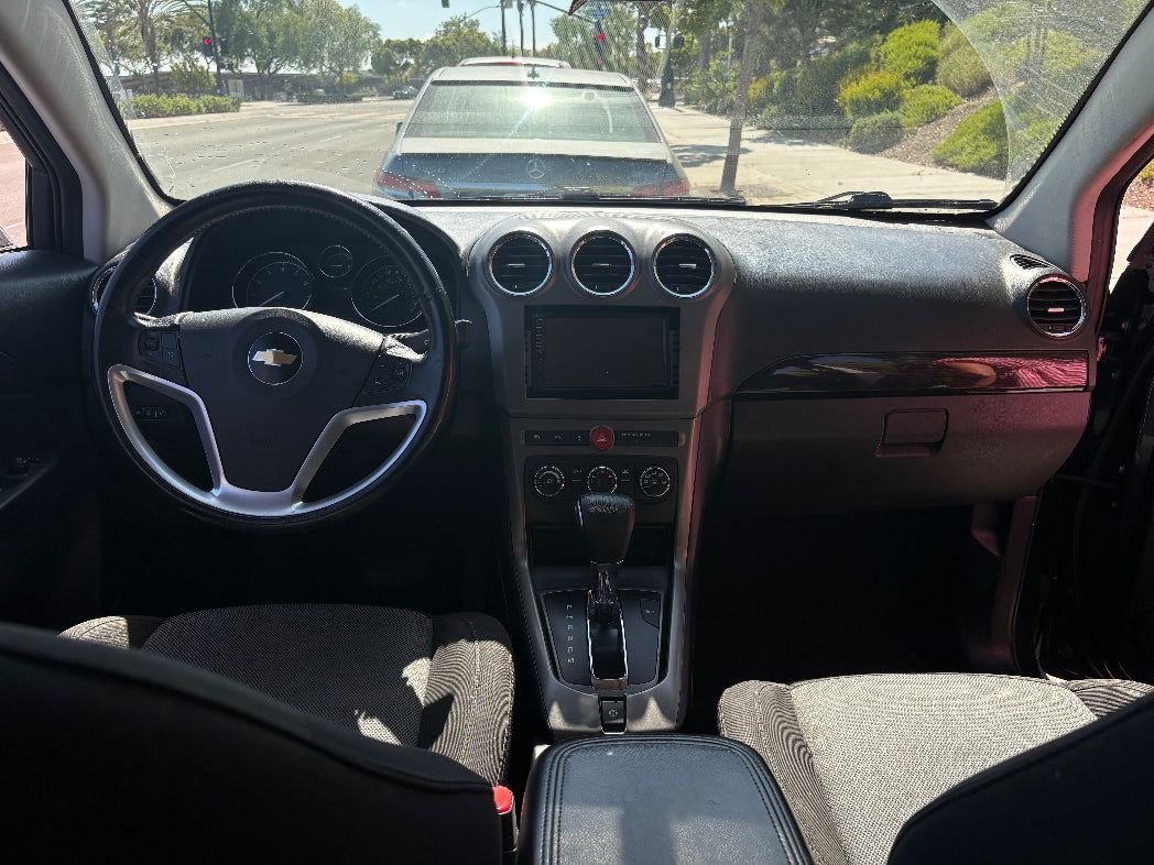Car interior with steering wheel and dashboard view