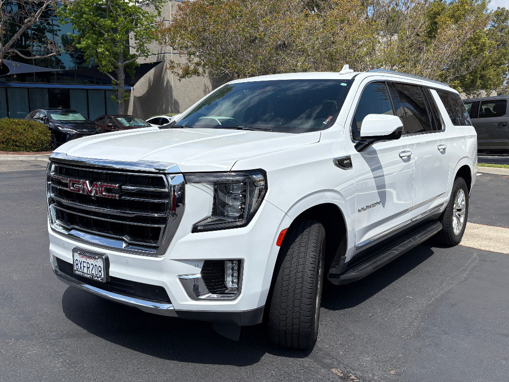 2024 GMC Yukon white SUV parked near San Diego beach