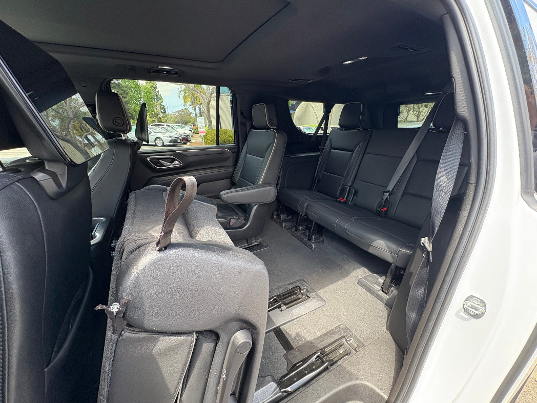 Spacious 3-row interior of GMC Yukon 2024 with leather seats