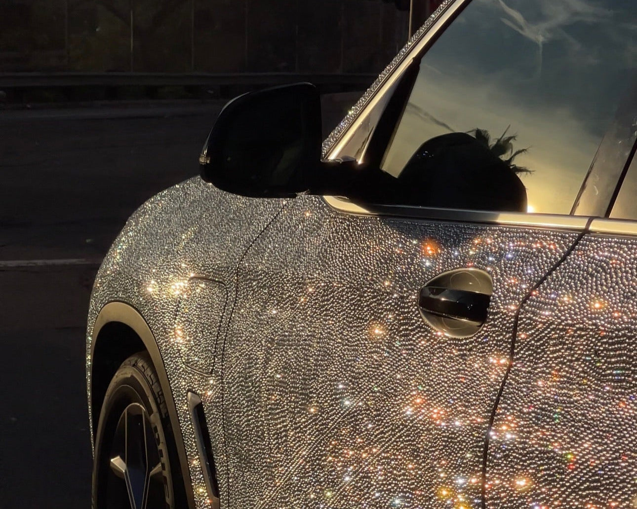 Crystal BMW X3 parked in San Diego – luxury car rental with a stunning shine effect