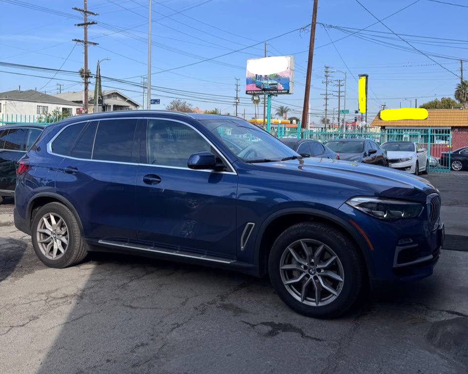 Front view of BMW X5 2021 – luxury car rental in San Diego with top safety features.