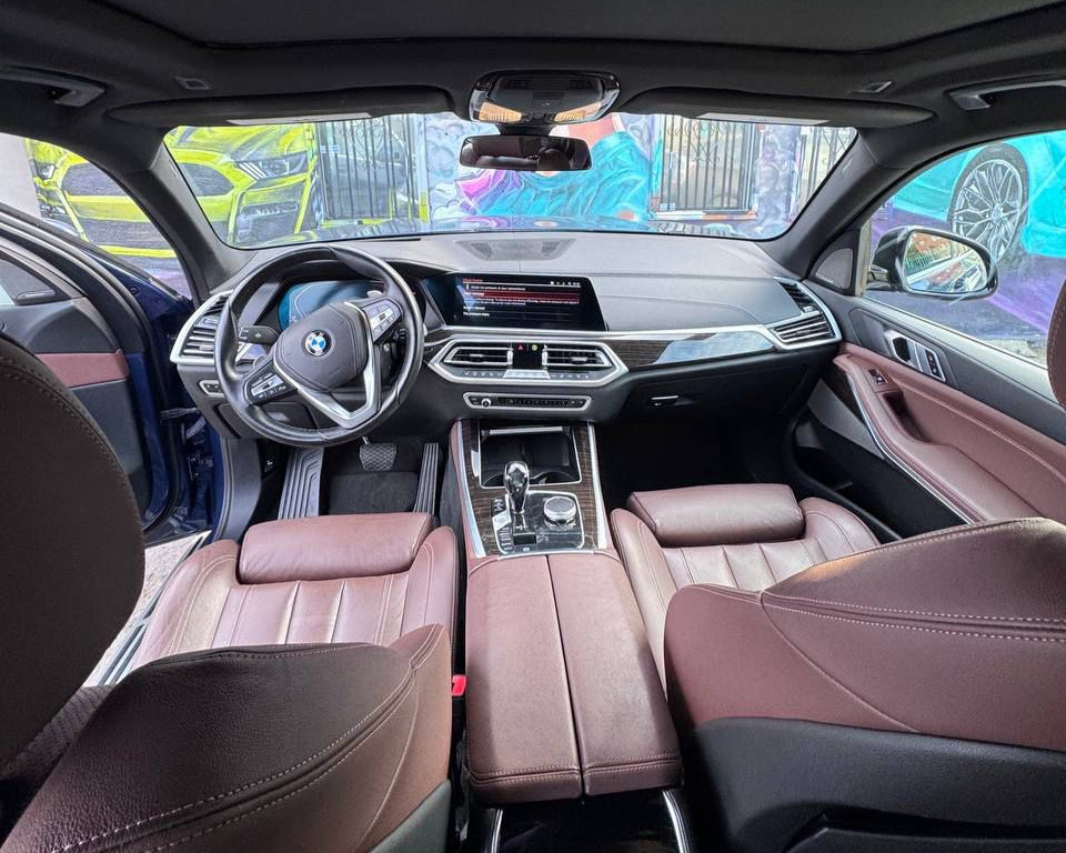 Interior of BMW X5 2021 – premium leather seats, advanced technology, and a comfortable ride