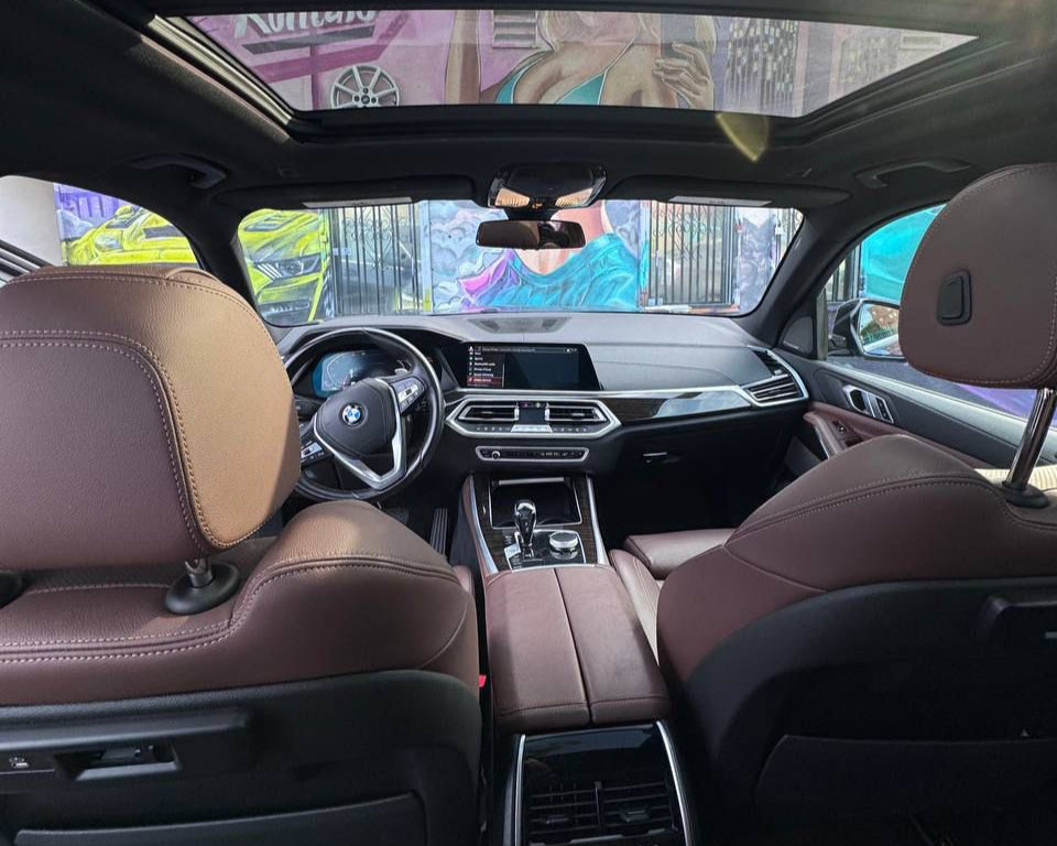Interior of BMW X5 2021 – premium leather seats, advanced technology, and a comfortable ride