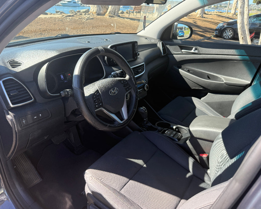 Dashboard and steering wheel of Hyundai Tucson rental car