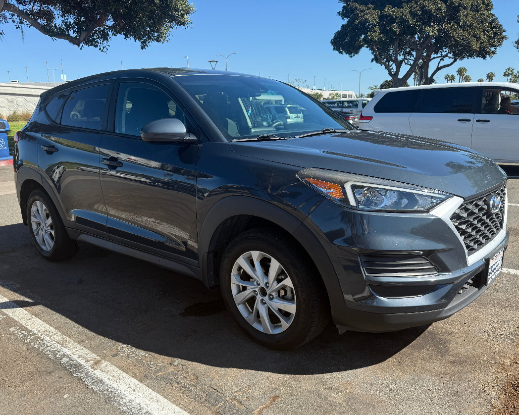 Side profile of Hyundai Tucson 2019 full-size SUV rental