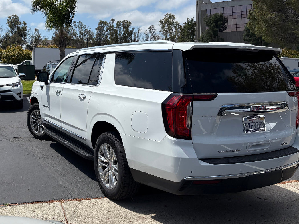 Rear cargo space of 2024 GMC Yukon – ideal for family luggage