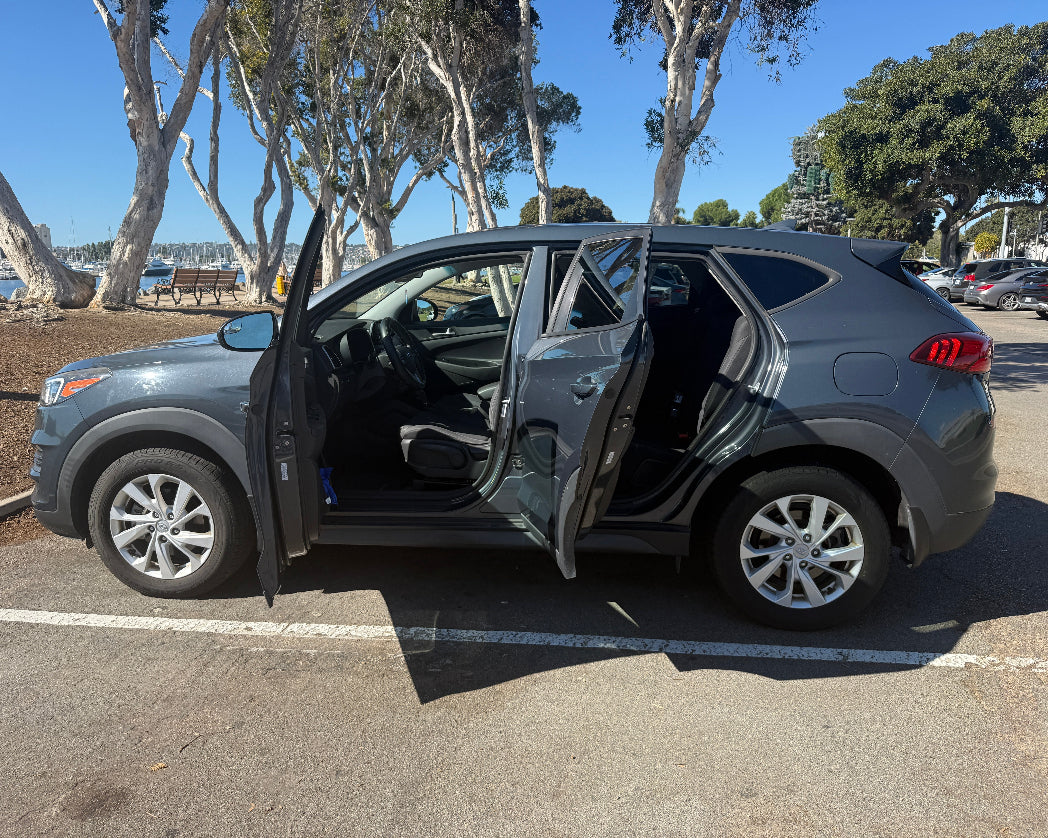 Hyundai Tucson rental SUV parked in San Diego airport