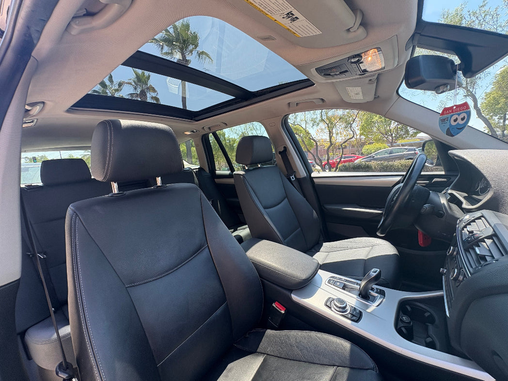 Car interior with sunroof and visible dashboard