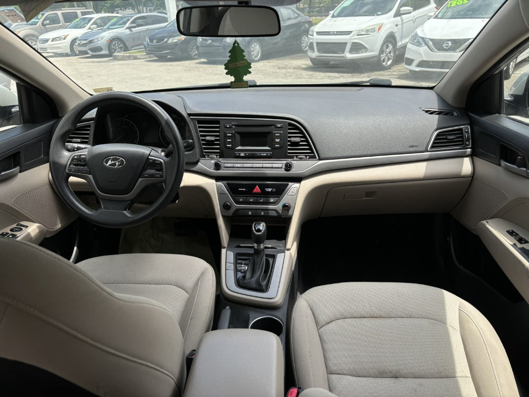 Comfortable beige seats inside Hyundai Elantra rental